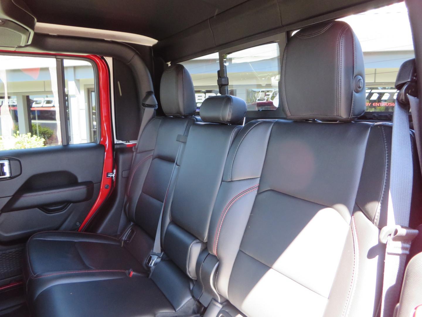 2020 Red /black Jeep Gladiator Rubicon (1C6JJTBG6LL) with an 3.6L V6 DOHC 24V engine, 6M transmission, located at 2630 Grass Valley Highway, Auburn, CA, 95603, (530) 508-5100, 38.937893, -121.095482 - Rubicon Gladiator featuring a Mopar suspension system with Fox shocks, 17" AEV wheels wrapped in 37" BFG tires, Warn Winch, Rock sliders, Cascade front license plate holder, Impact bedliner, Built Right Industries bed Molle panels, and Window tint. - Photo#42